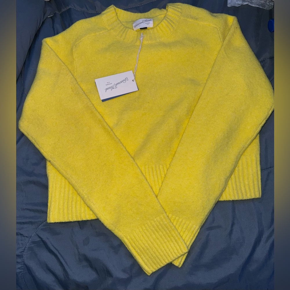 yellow long sleeve shirt